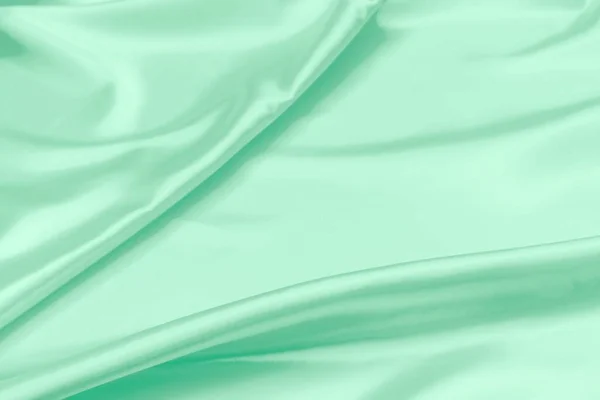 Green Satin Fabric Texture Soft Blur Background — Stock Photo, Image