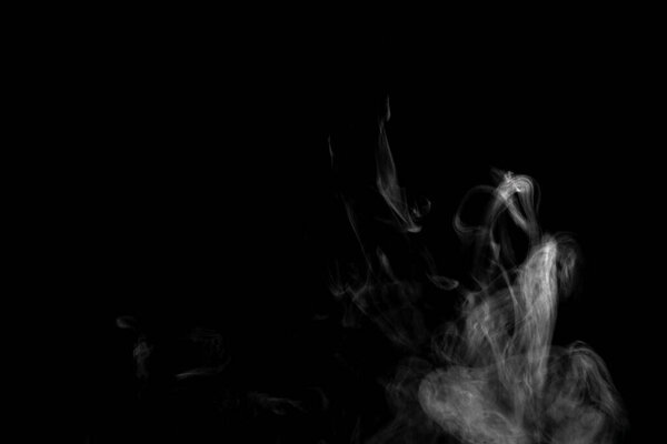 Abstract powder or smoke effect isolated on black background