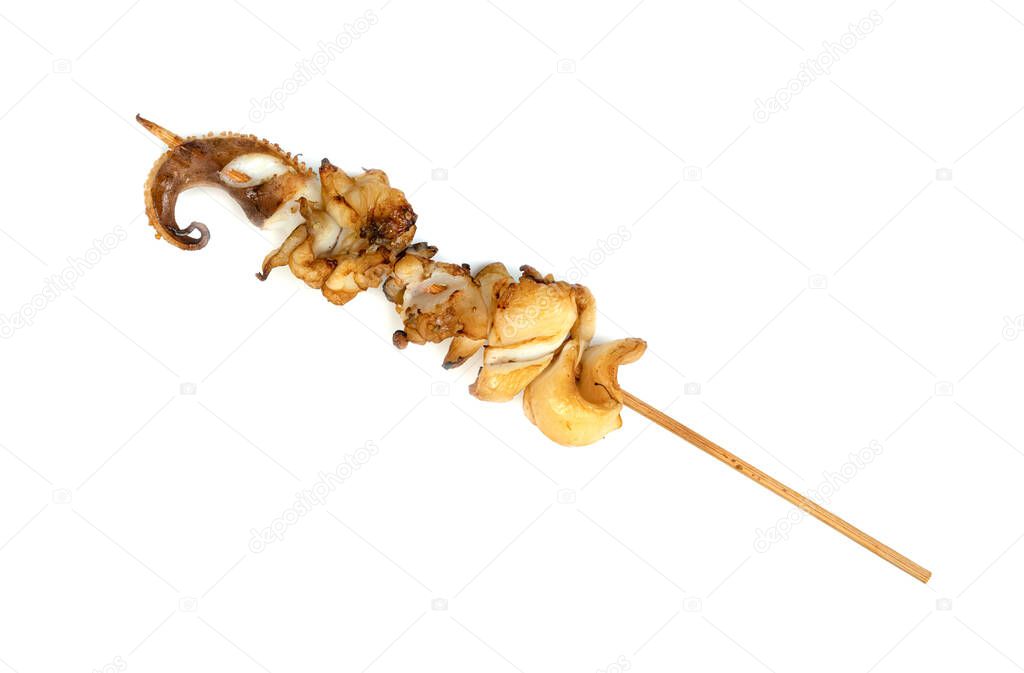 roast tentacles of squid with skewer isolated on white background