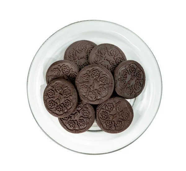 Černé Čokoládové Sušenky Skleněné Desce Izolované Bílém Pozadí Obsahují Ořezávání — Stock fotografie