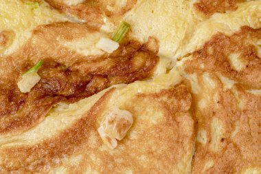 Yakın plan yumurta omleti dokusu arkaplanı.