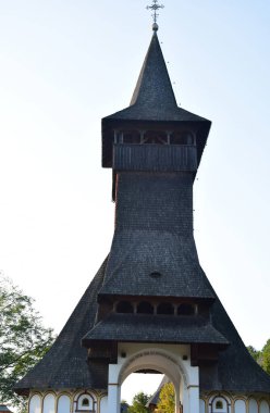 The Maramures wooden church from Barsana belongs to the large family of Romanian wooden churches, with the multiple roof (in steps) narrow but high, with long towers at the western end of the church