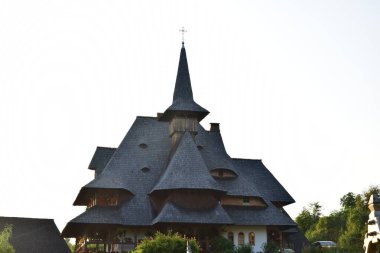 Barsana Orthodox Abbess, a multi-storey building in the Maramures style of wooden churches, with multiple roofs, beautifully decorated, in traditional style, intended for monastic rule 