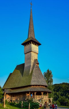 The Maramures wooden church from Barsana belongs to the large family of Romanian wooden churches, with the multiple roof (in steps) narrow but high, with long towers at the western end of the church