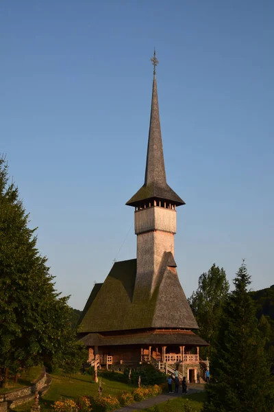 The Maramures wooden church from Barsana belongs to the large family of Romanian wooden churches, with the multiple roof (in steps) narrow but high, with long towers at the western end of the church