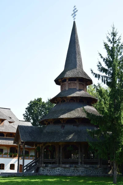 The summer altar from the Sapanta Peri Monastery - a wooden construction in Maramures style with a multi-storey roof made of wooden shingles, here the services take place on hot summer days