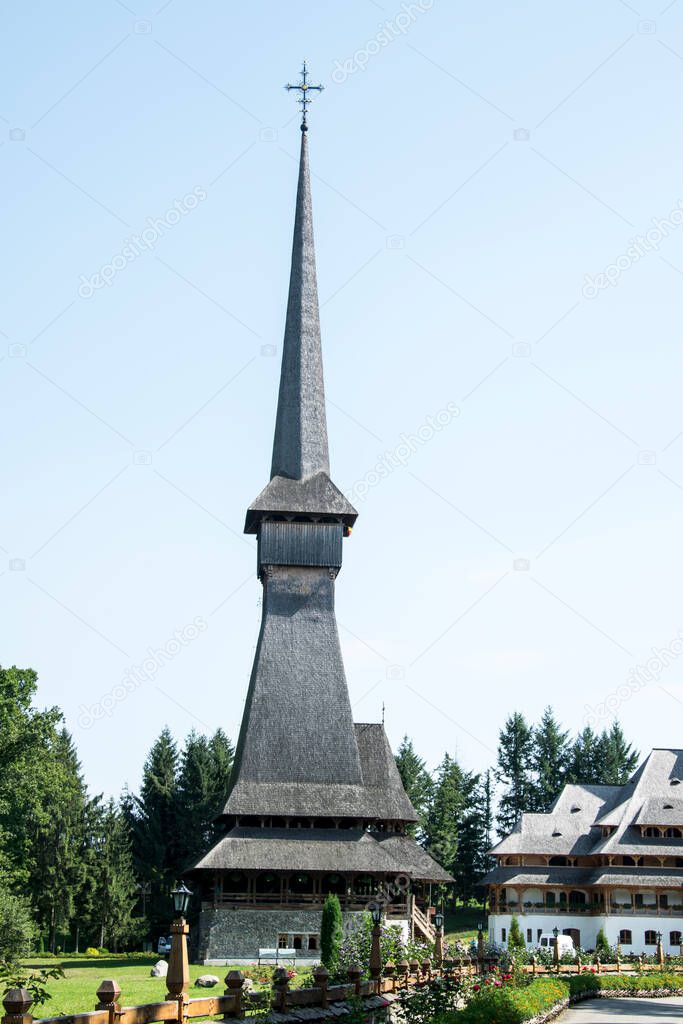 The church of the Sapanta Peri Monastery, Maramures built entirely of wood with a shingled roof, is the building that holds the world record in height for wooden constructions.