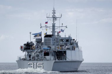 BALTIC SEA - 2021: Estonian Navys minehunter sailing on the sea  clipart