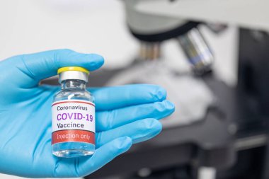 Laboratuvarda Coronavirus aşısı COVID-19 'un geliştirilmesi ve üretilmesi. Laboratuvarda Covid-19 aşısı.)
