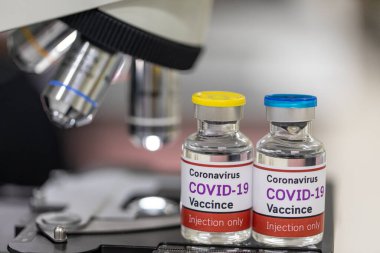 Laboratuvarda Coronavirus aşısı COVID-19 'un geliştirilmesi ve üretilmesi. Laboratuvarda Covid-19 aşısı.)