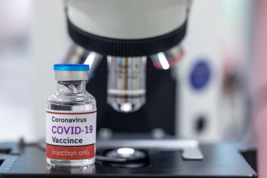 Laboratuvarda Coronavirus aşısı COVID-19 'un geliştirilmesi ve üretilmesi. Laboratuvarda Covid-19 aşısı.)