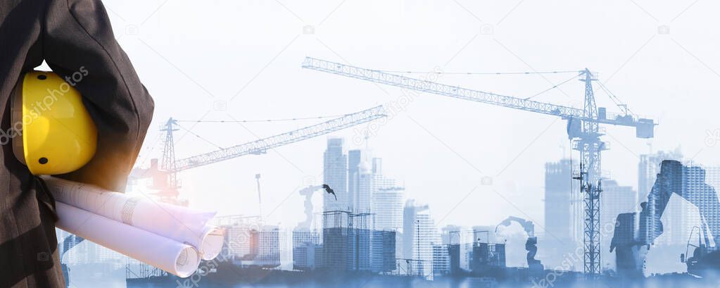 engineer on site with construction site background 