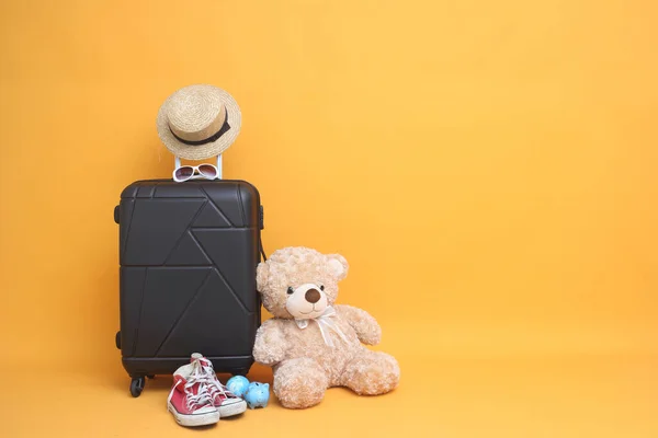 Black Suitcase Sun Glasses Hat Pastel Yellow Background Travel Concept — Stock Photo, Image