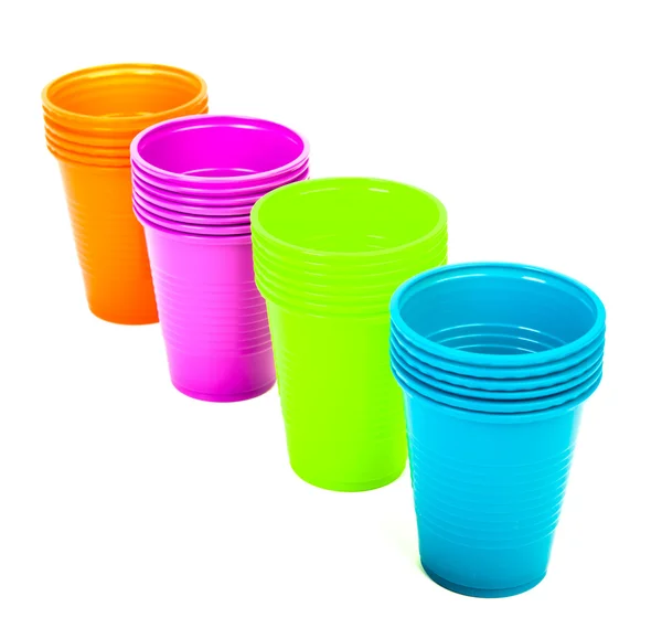 Bright plastic disposable cups isolated on white — Stock Photo, Image