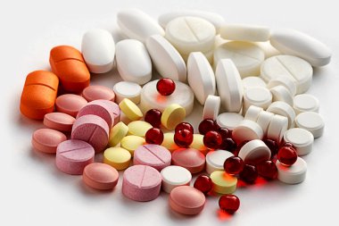 Multi-colored pills and tablets clipart