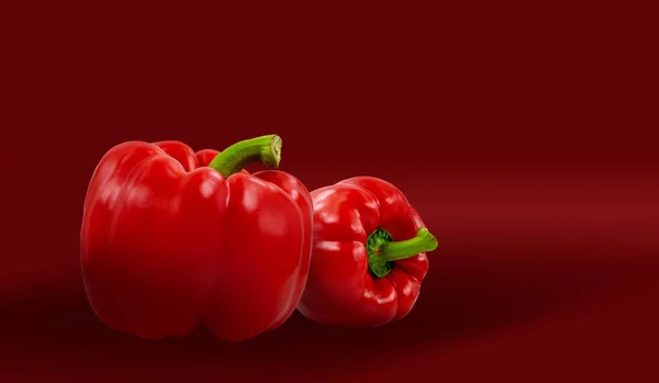 Kırmızı dolmalık biberin üzerindeki kompozisyon. Vejetaryenlik, sağlıklı yaşam tarzı, vitaminler..