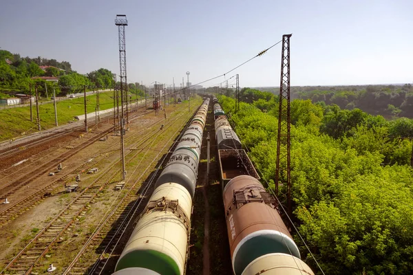 Railway tracks in the future. Train station near the city.