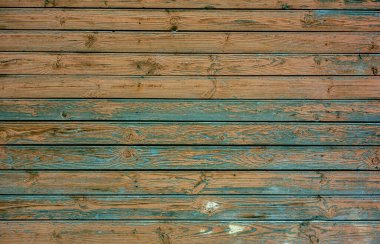 Eski bir yüzeyi olan ahşap bir duvar. Eski bir duvar ve koyu ahşaptan yapılmış zemin, gerçekçi tahta dokusu. Boş oda iç arkaplanı.