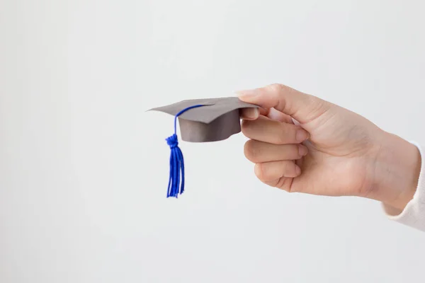 Hand Holding Graduation Hat White Background — Stock Photo, Image