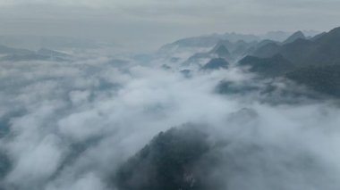 Time-lapse photography of the beautiful rural scenery of Libo County, Guizhou Province, China, shrouded in mist.