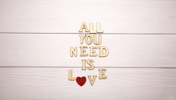 Inscription All You Need Love Wooden Letters White Wooden Background — Stockfoto