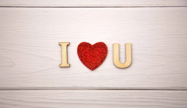 Das Wort Love You Aus Dekorativen Holzbuchstaben Auf Hellem Holzgrund — Stockfoto