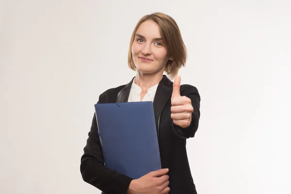 Business woman in a jacket with a folder in hands — Stock Photo, Image