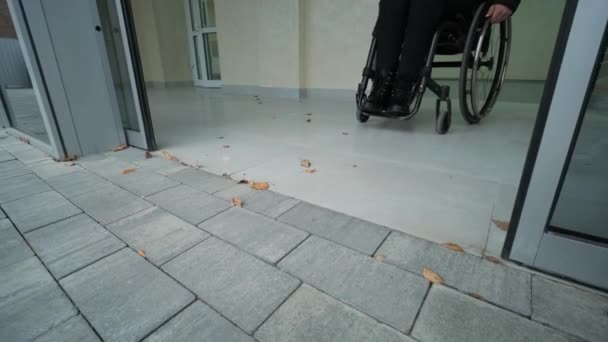 Disabled Woman Wheelchair Home Comes Out Modern Office Building — Stock Video