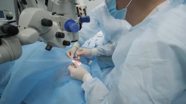 Surgery Team Making Strabismus Surgery Using Modern Technologies Latest Devices — Stock video