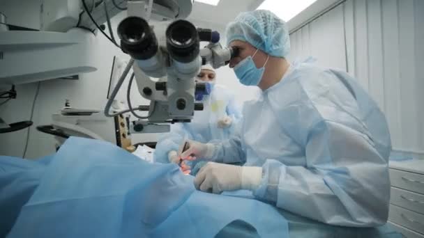 Surgery Team Making Strabismus Surgery Using Modern Technologies Latest Devices — Stock video