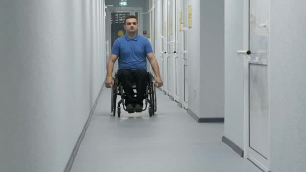 Man Wheelchair Drives Hallway Person Disability Moves Hospital — Wideo stockowe