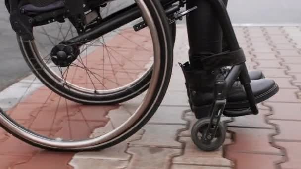 Person Disability Moves Street Wheelchair — Video