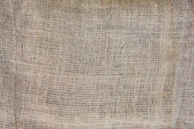 Çuval dokusu. Çuval bezi arka planı. Arka plan için doğal keten dokusu. Jute hessian çuval bezi bej, gri, kahverengi renkli kumaş çuval bezi dokuma deseni. Boşluğu kopyala