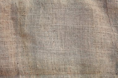 Çuval dokusu. Çuval bezi arka planı. Arka plan için doğal keten dokusu. Jute hessian çuval bezi bej, gri, kahverengi renkli kumaş çuval bezi dokuma deseni. Boşluğu kopyala