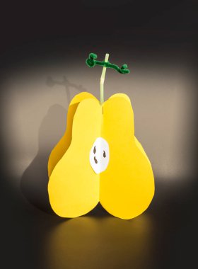 cardboard pear in three dimensions. Children's craft. clipart