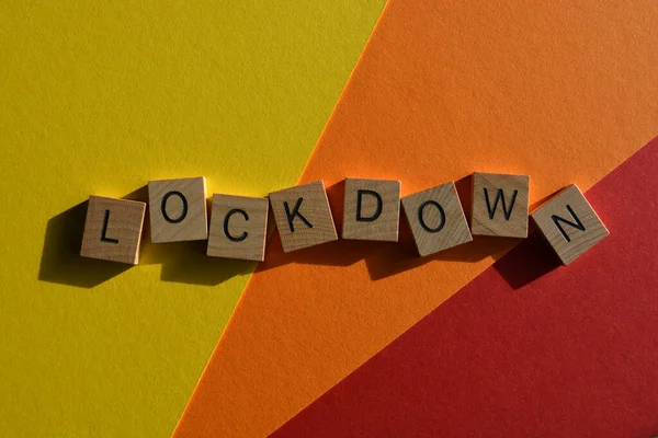 Lockdown Woord Houten Alfabet Letters Geïsoleerd Kleurrijke Achtergrond — Stockfoto