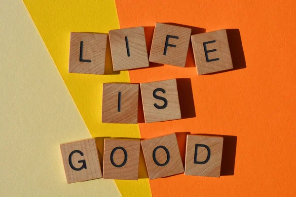 Life Good Motivational Words Wooden Alphabet Letters Isolated Orange Yellow — Fotografia de Stock