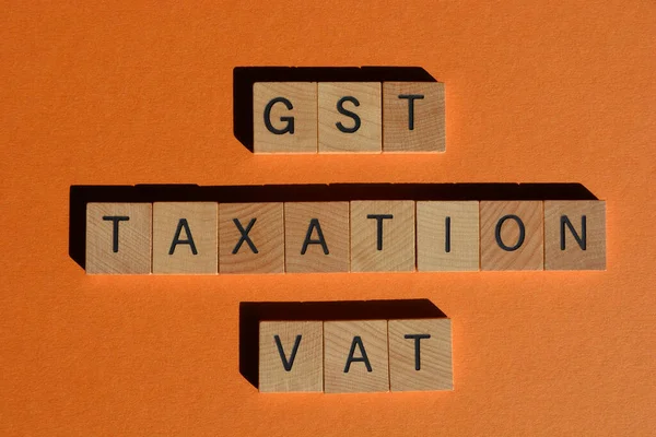 Gst Btw Belasting Woorden Houten Alfabet Letters Geïsoleerd Oranje Achtergrond — Stockfoto