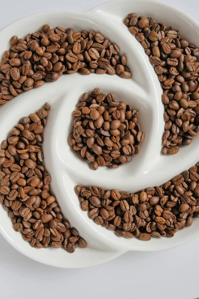 Granos de café. Granos de café tostados.Café Arábica. Bebida tradicional de la mañana. Textura de granos de café. Ingredientes vigorizantes de bebidas — Foto de Stock