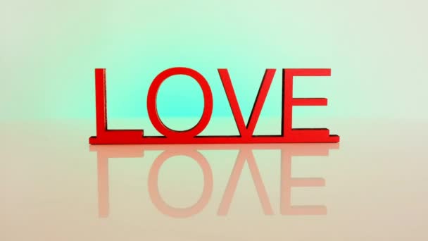Dia dos Namorados. Amor e relacionamentos.Conceito de amor. lettering Amor sobre um fundo verde — Vídeo de Stock