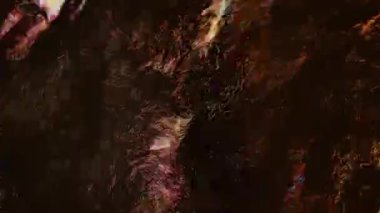 Işıldayan folyo arka planı. Çok renkli folyo kıvrımları. Parlak, renkli model. Uzayı kopyala Işığın oyunu. Parlak gradyan ışıltılı folyo arka plan. Dokulu, güzel arka plan. 4k görüntü