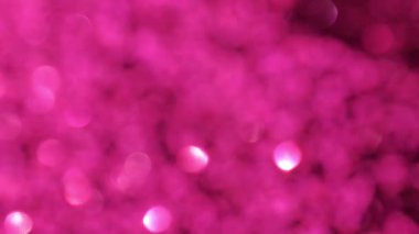 Işıldayan pembe sim dokusu. Mor tonlarda parıldayan duvar kağıdı. Parıldayan doku, metin alanının bir kopyası. 4k görüntü