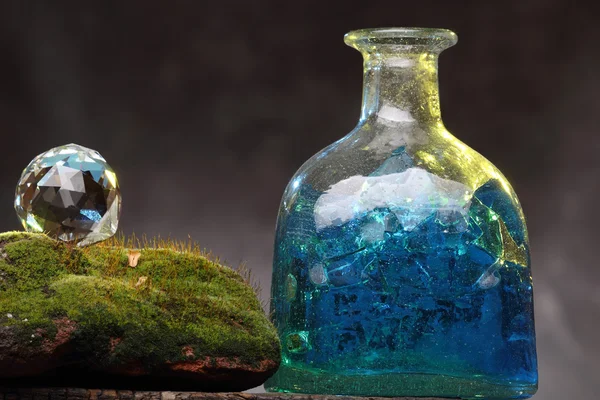 Still-life with old bottle and moss. Ecology Concept — Stock Photo, Image