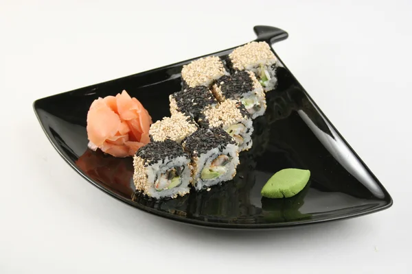 Sushi rulle med havsål i sesam Stockfoto