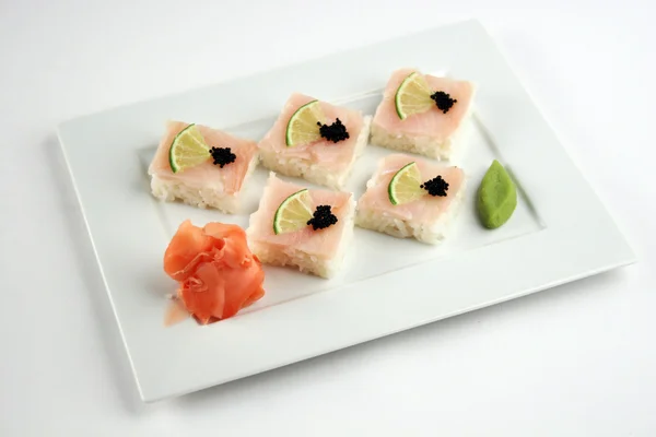 Sushi with perch, lime and black caviar — Stock Photo, Image