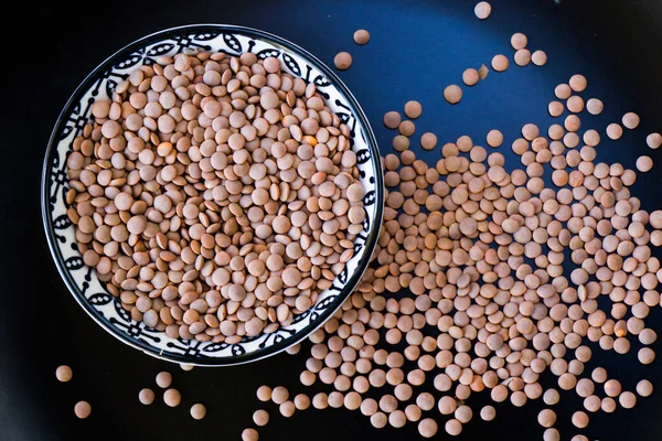 Healthy grains, green lentils and full of vitamins, close-up