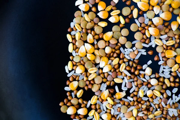 Healthy grains, full of vitamins on the black background