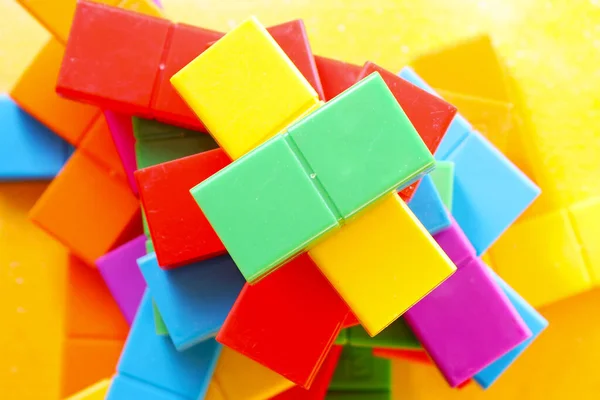 Barevné Puzzle Kostky Pozadí Geometrické Postavy Stolní Hra Pestrobarevné — Stock fotografie
