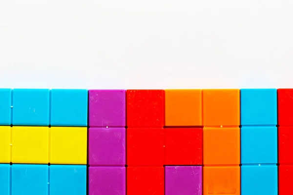 Cubos Quebra Cabeça Coloridos Fundo Figuras Geométricas Jogo Mesa Multicolorido — Fotografia de Stock