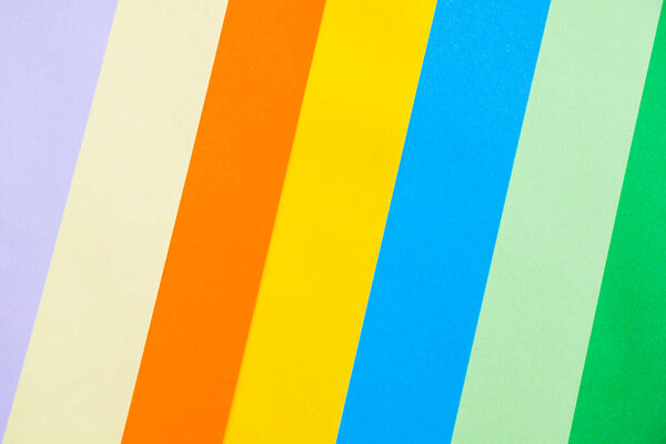 Цветной бумажный фон, бумажная доска и геометрические фигуры, пастельные цвета